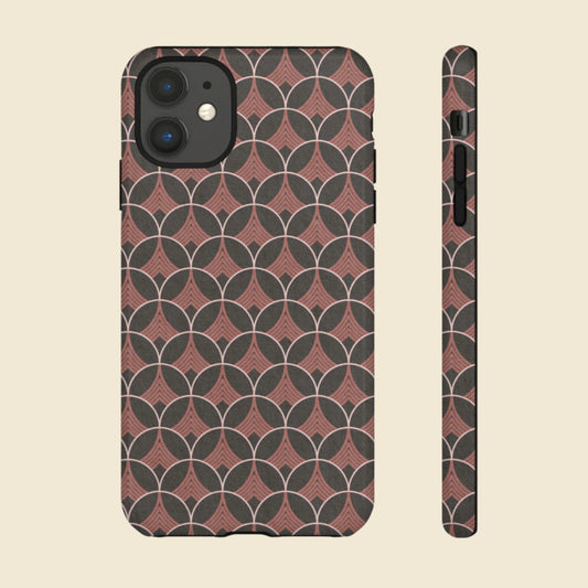 Phone case with dark gray and pink geometric pattern on a cream background